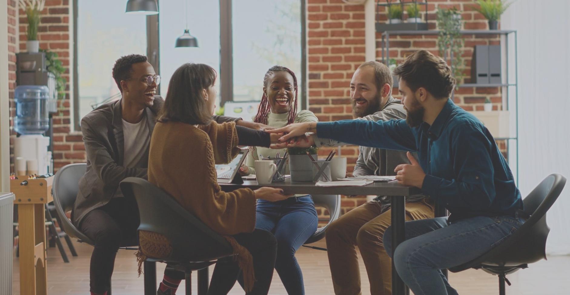 Community financial education workshop with participants learning budgeting basics